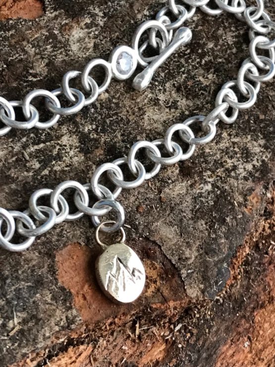 Silver, Gold and Crystal Mountain Charm Bracelet